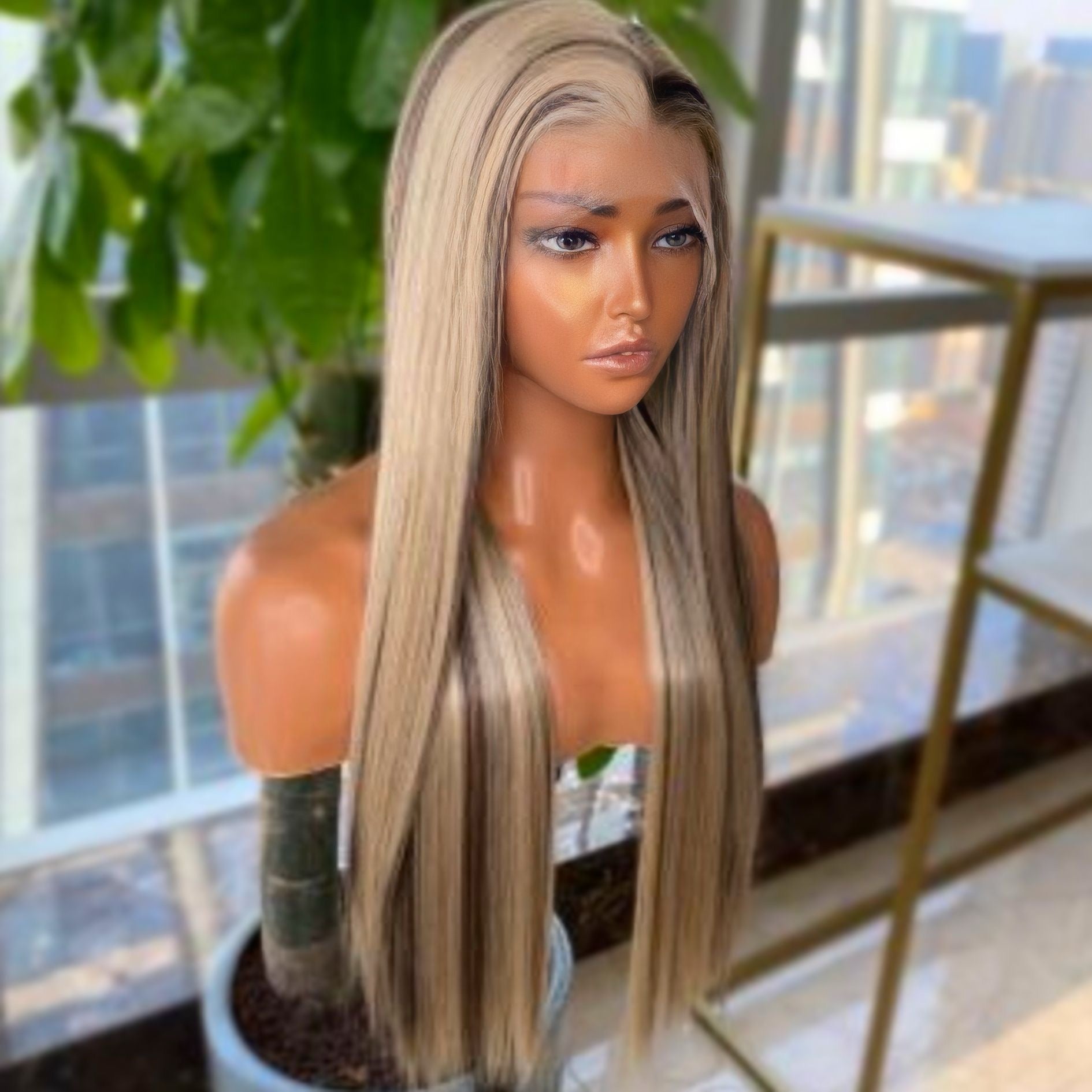 Blonde with bold brown highlights straight lace front synthetic wig featuring heat-resistant synthetic fibers for versatile styling.