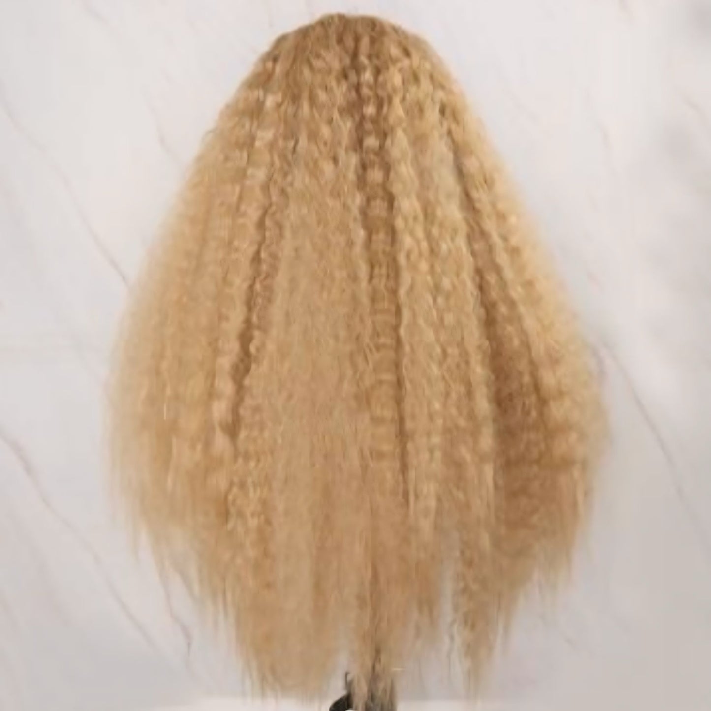 Close-up of a Textured Curly Blonde Synthetic Lace Front Wig, highlighting the heat-resistant fibers and adjustable cap features.