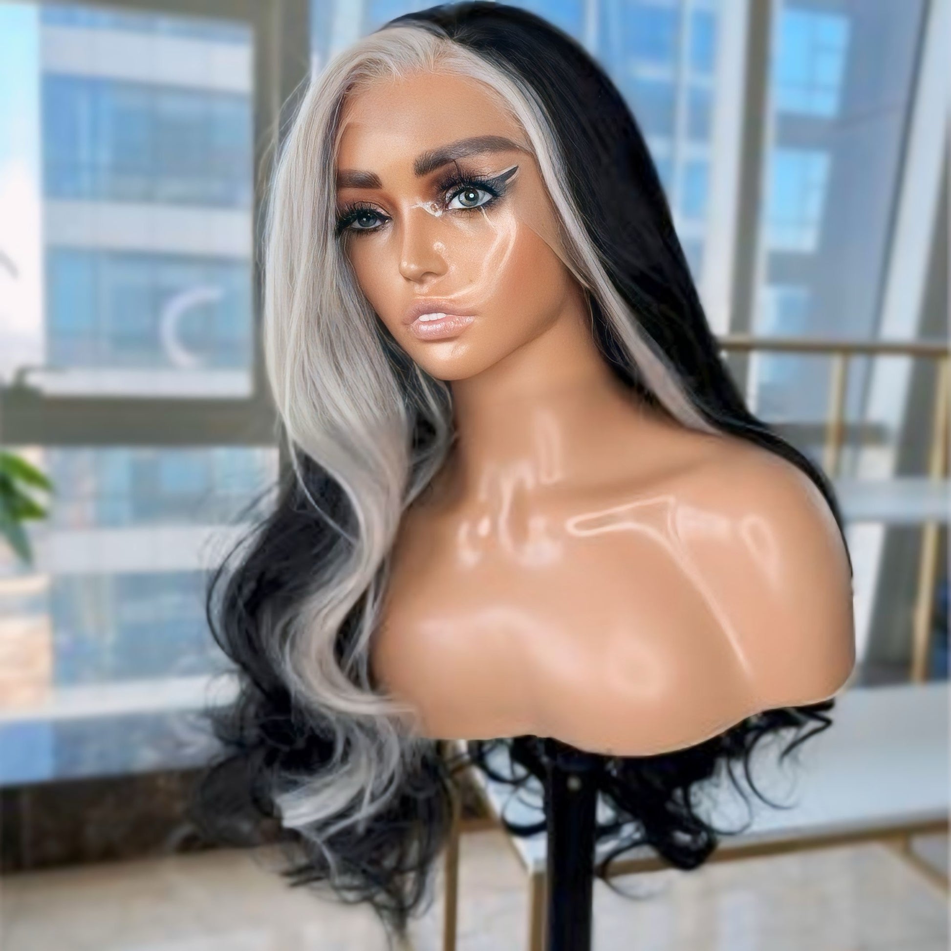 Close-up of black synthetic wig with white money piece highlights, 130% density and natural hairline