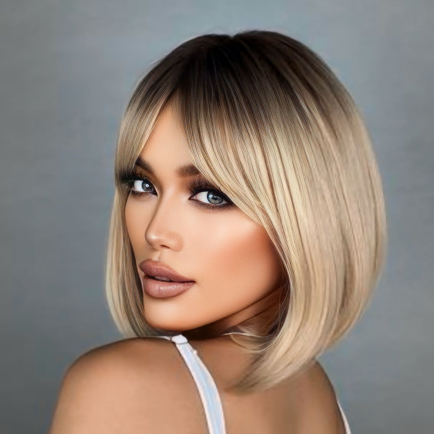 Model wearing Natural Ash Rooted Blonde Bob Wig, perfect for daily wear and special occasions