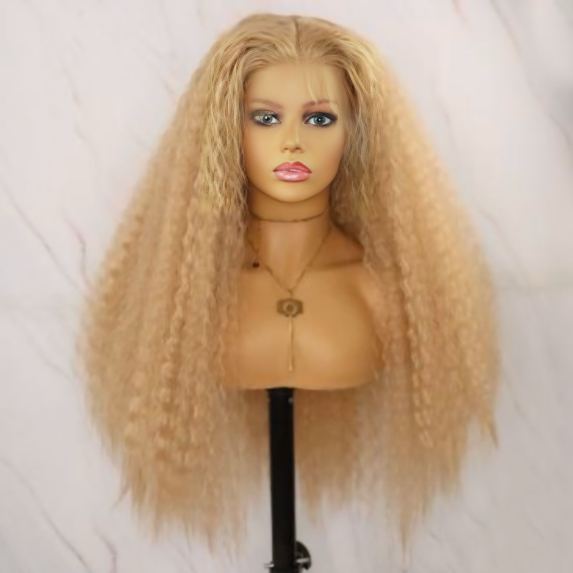 Textured Curly Blonde Synthetic Lace Front Wig displayed on a mannequin, showcasing natural-looking curls and a comfortable fit.
