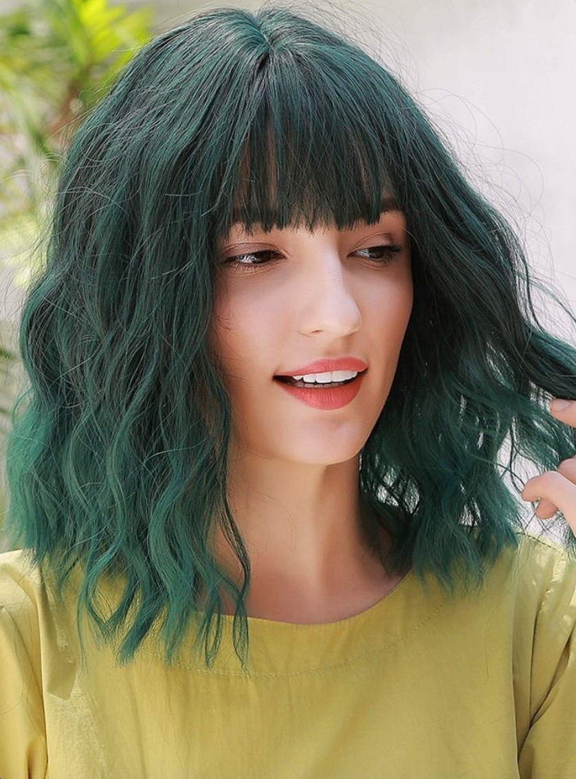 Close-Up of Dark Green Wavy Wig Showing Realistic Texture and Comfortable Fit
